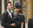 Victoria Beckham si palaria ei sobra, dar foarte speciala. Linga Victoria, sotul ei, David Beckham, purtind in mina elegantul joben (foto: Reuters)