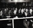 Dej vorbeşte de la prezidiu, în Sala Mare a stadionului Giuleşti, în timp ce tovarăşii îl ascultă cu interes şi simţ patriotic