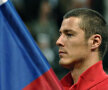 Marat Safin şi steagul Rusiei. El spune despre sine: "Sînt un patriot, îmi iubesc ţara şi oraşul natal, Moscova"