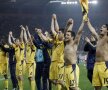 Jucătorii lui Metalist celebrează. Au întors rezultatul "dublei" cu Olympiakos în chiar ultimul sfert de oră al meciului retur (foto: Daylife)