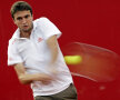 Gilles Simon jucînd cu o rachetă-fantomă! Foto: Raed Krishan