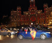 MADRIDUL FERICIT. Suporterii lui Atletico au celebrat triumful şi la Madrid. Inclusiv în Plaza de Cibeles, locul de sărbătoare al rivalei Real // Foto: Reuters