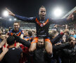 Jucătorii lui Montpellier sărbătoresc titlul după meciul cu peripeții de la Auxerre, întrerupt în total 41 de minute din cauza fanilor gazdă // Foto: Reuters