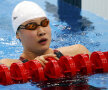 Ochii mari ai campioanei. Chinezoaica Jiao Liuyang a făcut o cursă de aur, şi de record olimpic, la 200 m fluture şi se uita mirată la rivale: eu sînt prima? // Foto: Reuters