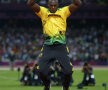 Aşa a sărit Usain Bolt pe podiumul de la 200 metri