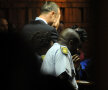 Oscar Pistorius, în lacrimi la tribunal.