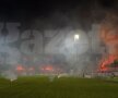 Suporterii rapidiști au
creat un adevărat
spectacol pirotehnic, ce a
întîrziat debutul partidei cu
5 minute Foto: Cristi Preda