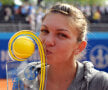 2013. Nurnberg. Simona sărută primul său trofeu WTA