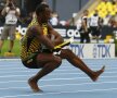 Usain Bolt și un kazaciok pe pista de atletism // Foto: Reuters