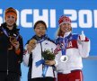 Margot Boer (Olanda), Lee Sang-hwa (Coreea de Sud) şi Olga Fatkulina (Rusia) cu medaliile lor după proba de patinaj viteză, 500 de metri