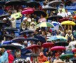 NEW YORK. Explozie de culoare în tribune la US Open, unde o dată ce începe ploaia înfloresc sute de umbrele //Foto: Reuters