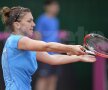 Test de iubire necondiţionată » Simona Halep a jucat două meciuri într-o zi, a cîştigat doar unul, dar a fost răsplătită permanent cu uralele fanilor români