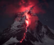 VIDEO şi FOTO Imagini fabuloase » Alpii "au luat foc" sub asediul a sute de alpinişti, într-un proiect fotografic grandios
