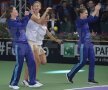 Alexandra Dulgheru, Irina Begu, Monica Niculescu şi Simona Halep (de la stînga la dreapta) sărbătorind victoria contra Spaniei // Foto: Cristi Preda