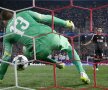 Oblak și-a spălat păcatele pentru meciul din grupe cu Olympiakos, ajutat și de execuția jenantă a lui Calhanoglu de la 11 metri // Foto: Reuters