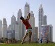 
PASIUNE ȘI RELAXARE. Fă ceea ce îți place și nu va mai trebui să muncești nici măcar o zi. Britanica Melissa Reid îmbină utilul cu plăcutul la turneul de golf din Dubai (foto: Reuters)
