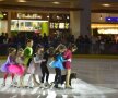 Perechea
sportivăumbră,
spectacol
pe gheața
din mall