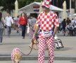 Un fan adevărat. Pînă și câinele și l-a costumat în culorile naționalei // Foto: Raed Krishan