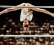 40 de ani de la zborul perfect. Nadia sfidează gravitația la paralele inegale, luând primul 10 în proba pe echipe de la JO 1976, foto: AFP