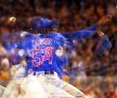 Aroldis Chapman (Chicago Cubs) a fost surprins de fotoreporterii Reuters într-o aruncătură ce aduce aminte de legendarul Kartavirya Arjuna, regele cu o mie de mâini