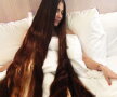 FOTO » O tânără din Letonia are părul mai lung de 2,2 metri