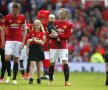 Rooney și unul dintre fiii săi Foto: Reuters