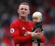 Rooney și unul dintre fiii săi Foto: Reuters