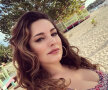 FOTO HOT Kelly Brook a renunțat la aproape toate hainele pentru a poza într-un calendar sexy