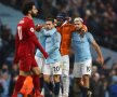 GAME ON. Kun Aguero și colegii de la City sunt fericiți după succesul care îi readuce în lupta pentru titlu în Premier League. În schimb, superstarul Mo Salah este descumpănit sub ochii rivalilor (foto: Guliver/GettyImages)