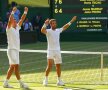 Tecău și Rojer, sărbătorind trofeul câștigat la Wimbledon FOTO: Guliver/GettyImages