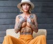 GALERIE FOTO Premiul de Ziua Blondelor! E „obsedată” de sală și de tatuaje: imaginile sunt spectaculoase!
