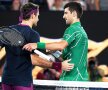 Roger Federer și Novak Djokovic la fileu, după meciul de la Australian Open 2020