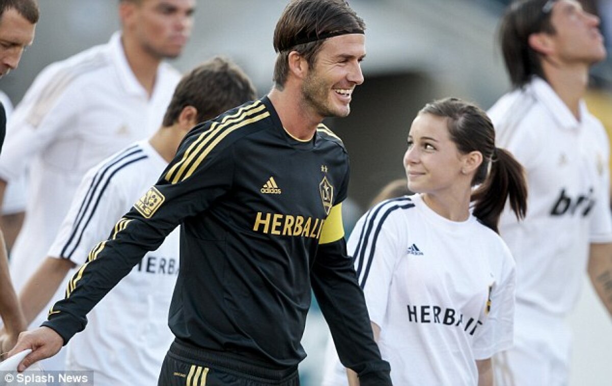 FOTO » Primele poze cu fata lui David Beckham!