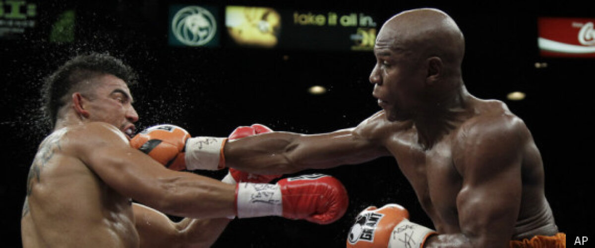 KO ucigător » Floyd Mayweather Jr a revenit cu un succes controversat şi este noul campion mondial WBC