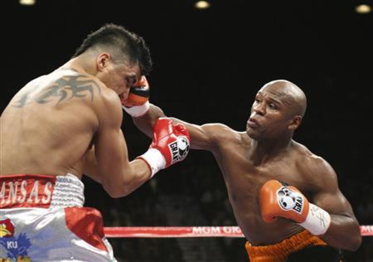 KO ucigător » Floyd Mayweather Jr a revenit cu un succes controversat şi este noul campion mondial WBC