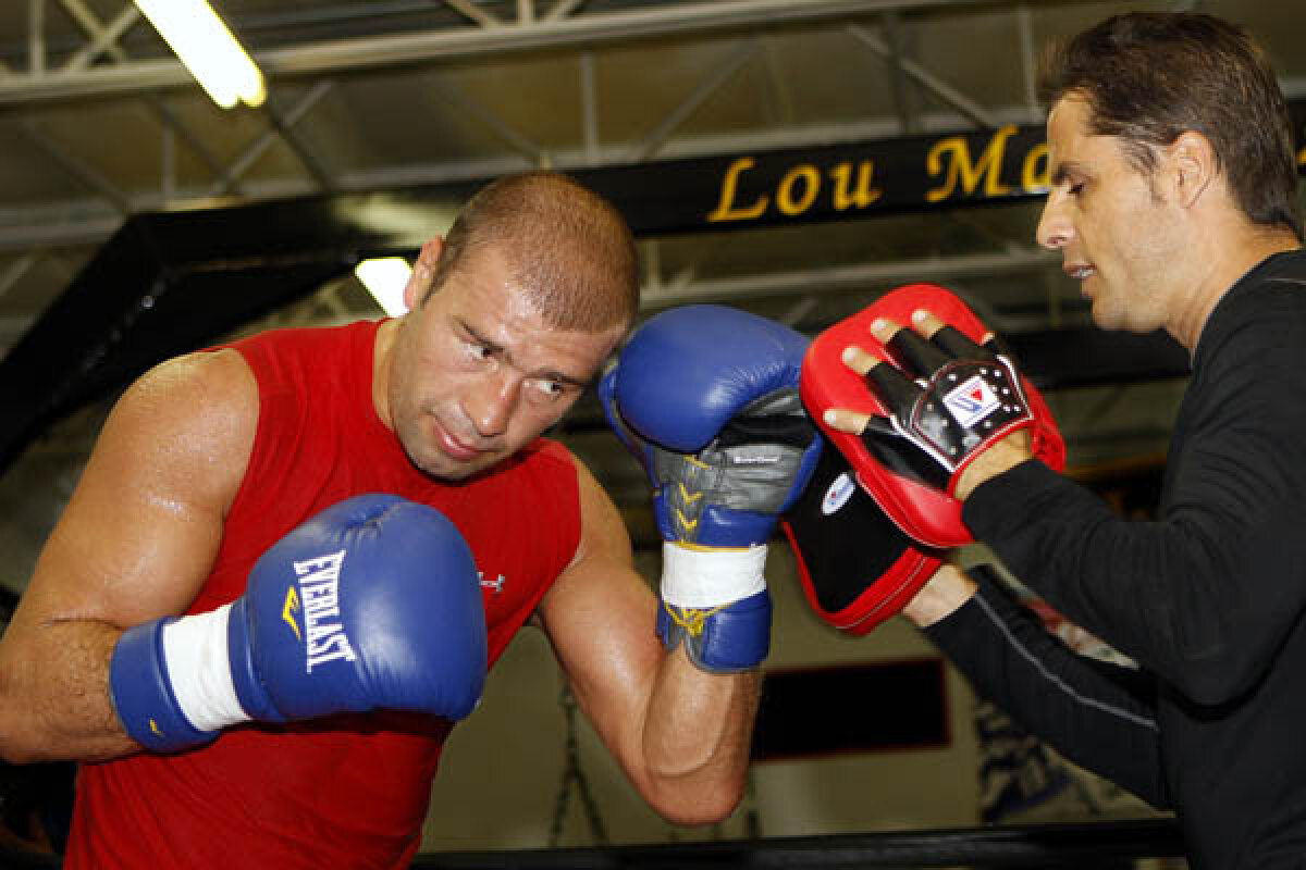 FOTO şi VIDEO/Bute, pregătit pentru Johnson » Mesajul românului pentru adversari: ”Sînt aici pentru toţi”