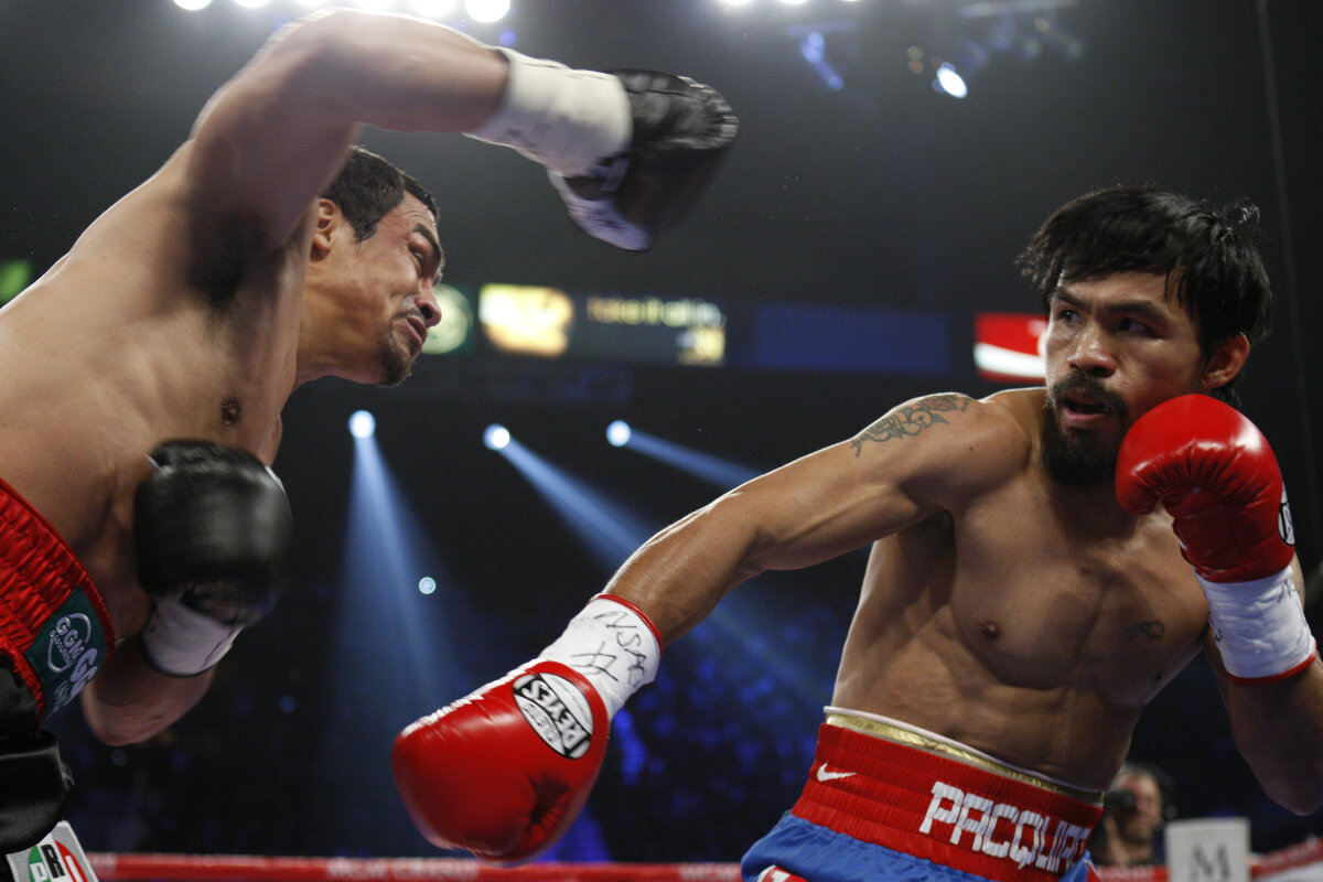 FOTO » Fără KO! » Pacquiao rămîne neînvins în faţa lui Marquez şi păstrează titlul mondial!
