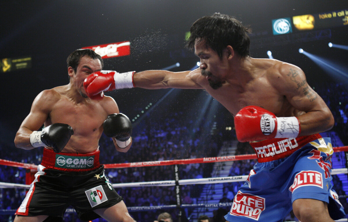 FOTO » Fără KO! » Pacquiao rămîne neînvins în faţa lui Marquez şi păstrează titlul mondial!