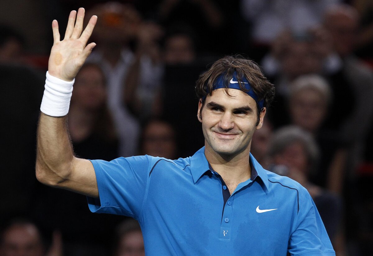 FOTO Federer l-a învins pe Tsonga în finala de la Paris Bercy şi a cîştigat al 18-lea Masters din carieră