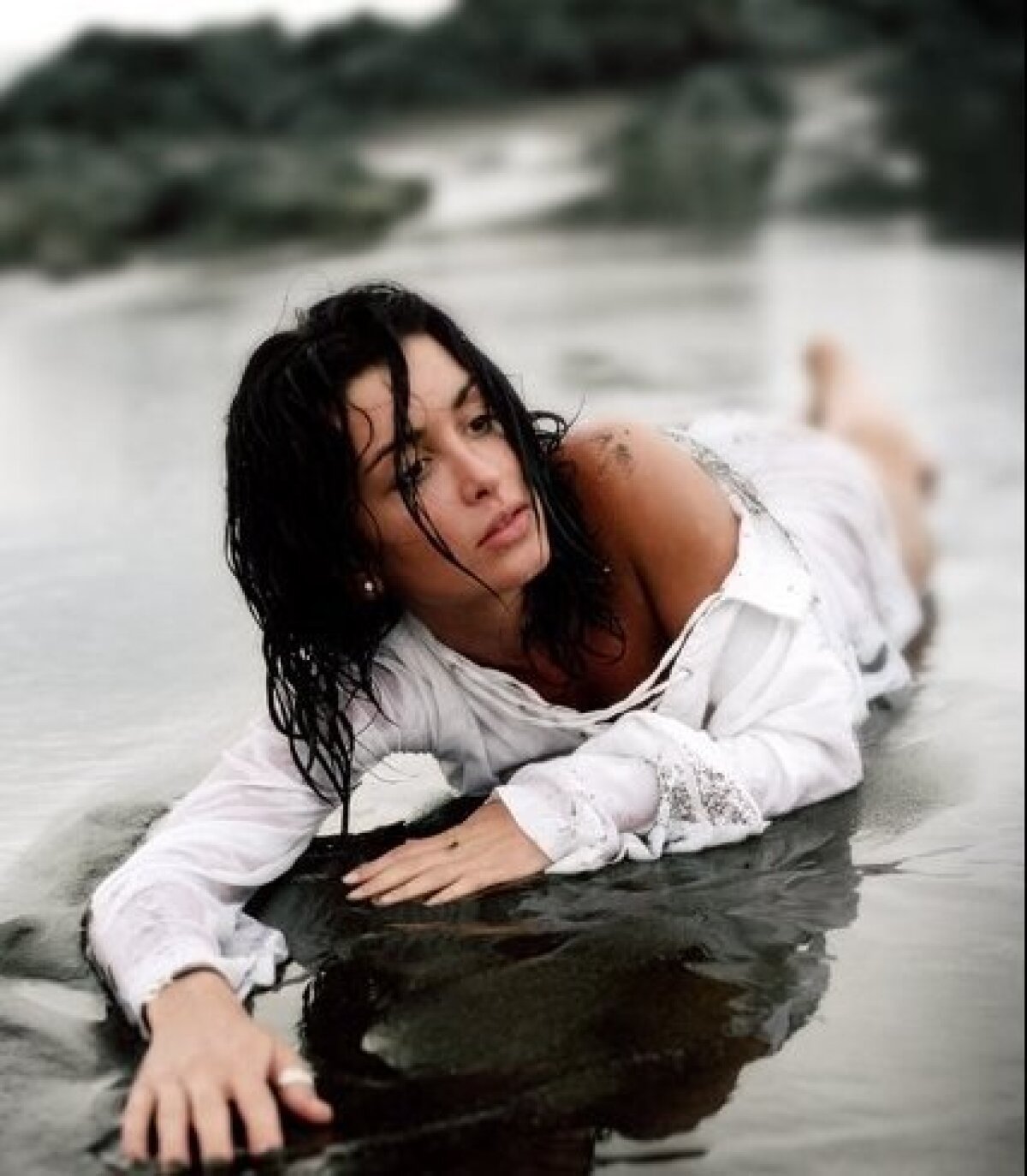 FOTO Benzema nu mai e singur. O cîntăreaţă a pus mîna pe el