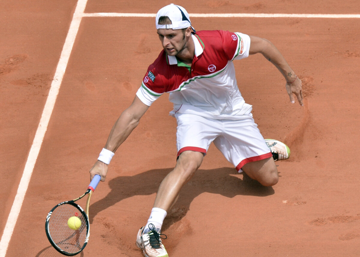 Felicitat de Federer » Adrian Ungur a reuşit ieri să-i ia un set fostului lider mondial