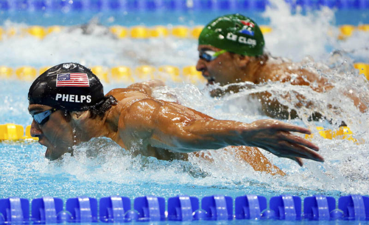 Uriaşul fluture de apă şi gimnasta balerină » Michael Phelps a devenit cel mai medaliat sportiv din istoria Jocurilor Olimpice