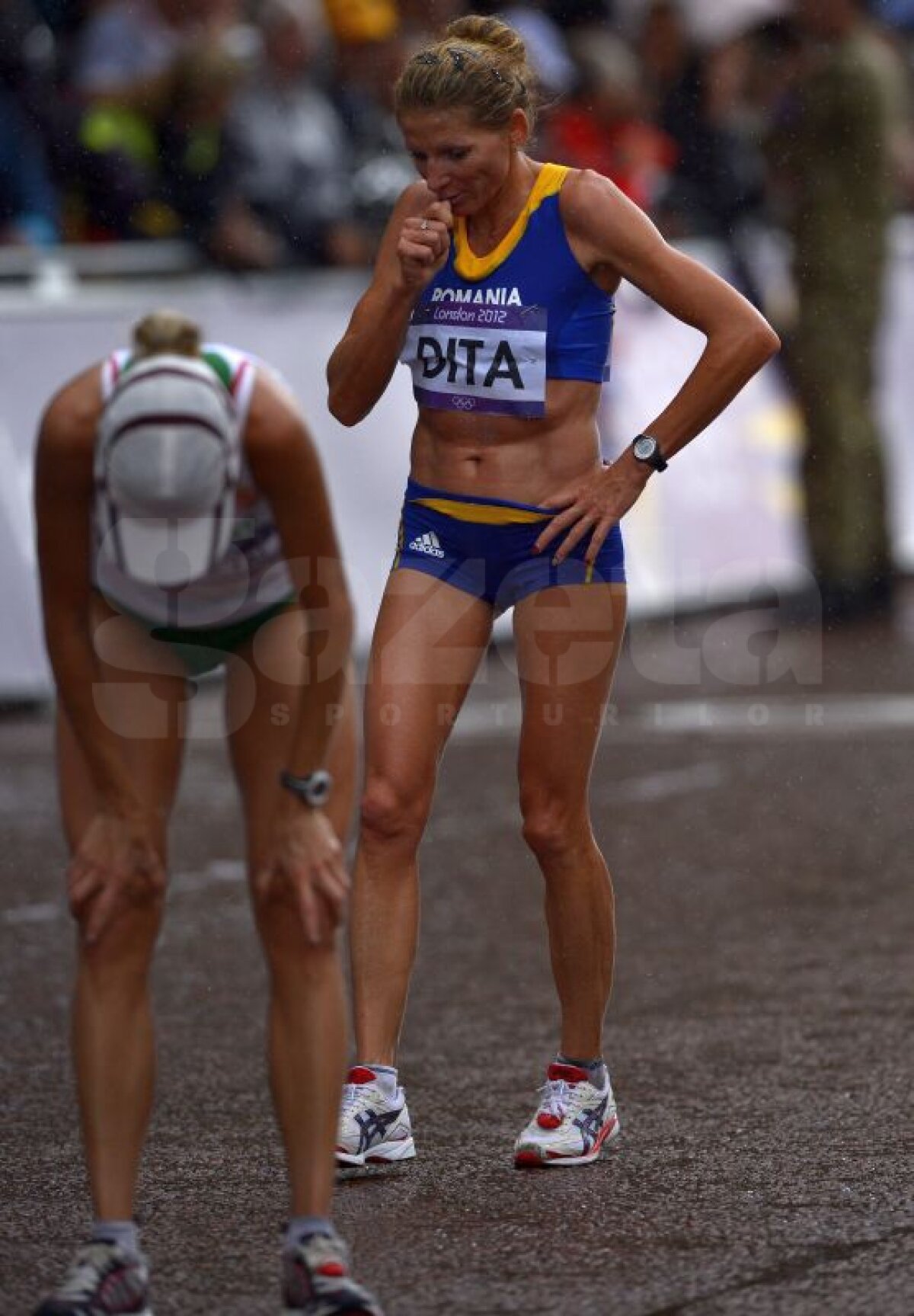 GALERIE FOTO » Tiki Gelana e noua campioană olimpică la maraton! Şimon pe 45, Diţă pe 86!