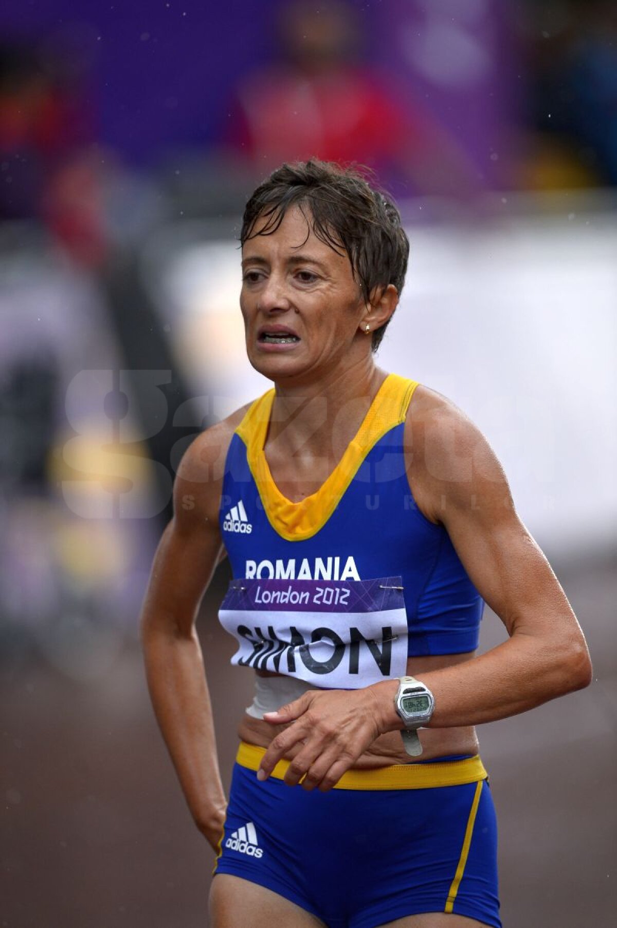 GALERIE FOTO » Tiki Gelana e noua campioană olimpică la maraton! Şimon pe 45, Diţă pe 86!