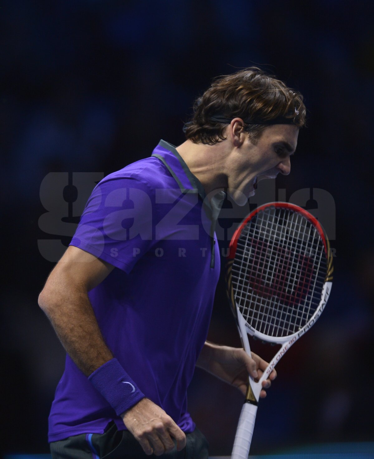 GALERIE FOTO Cele mai interesante imagini cu Federer în acţiune » Elveţianul a cîştigat primul meci la Turneul Campionilor