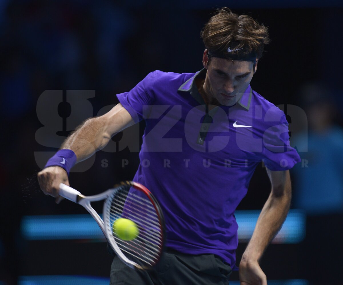 GALERIE FOTO Cele mai interesante imagini cu Federer în acţiune » Elveţianul a cîştigat primul meci la Turneul Campionilor