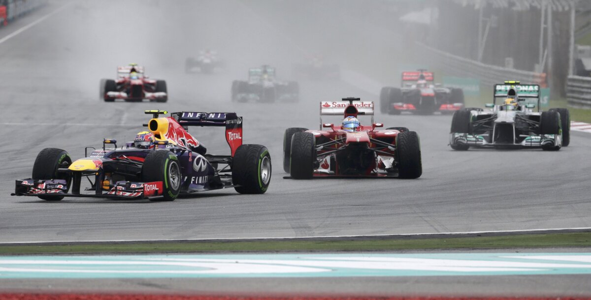 FOTO şi VIDEO Marele Premiu al Malaeziei » Vettel s-a impus, Alonso a abandonat în turul 2