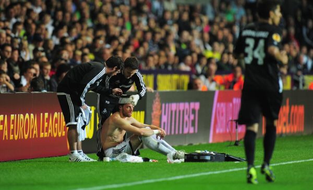 FOTO Cinci tricouri pline de sînge! » Michu, atacantul lui Swansea, lovit cu gheata-n cap la 1-0 cu St. Gall