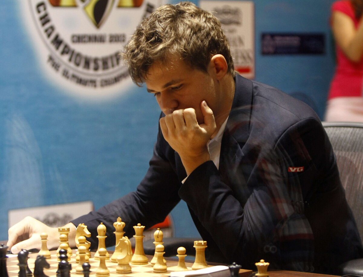 FOTO&VIDEO Magnus Carlsen este noul campion mondial de şah » Cine este norvegianul comparat cu Garry Kasparov