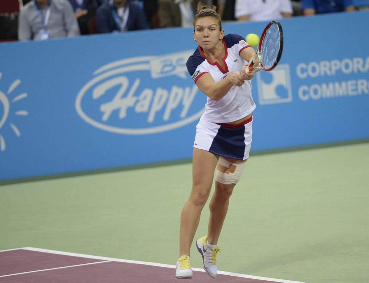 Pantofii Simonei, vînduţi la o licitaţie de caritate pentru copii orfani şi suferinzi de autism!